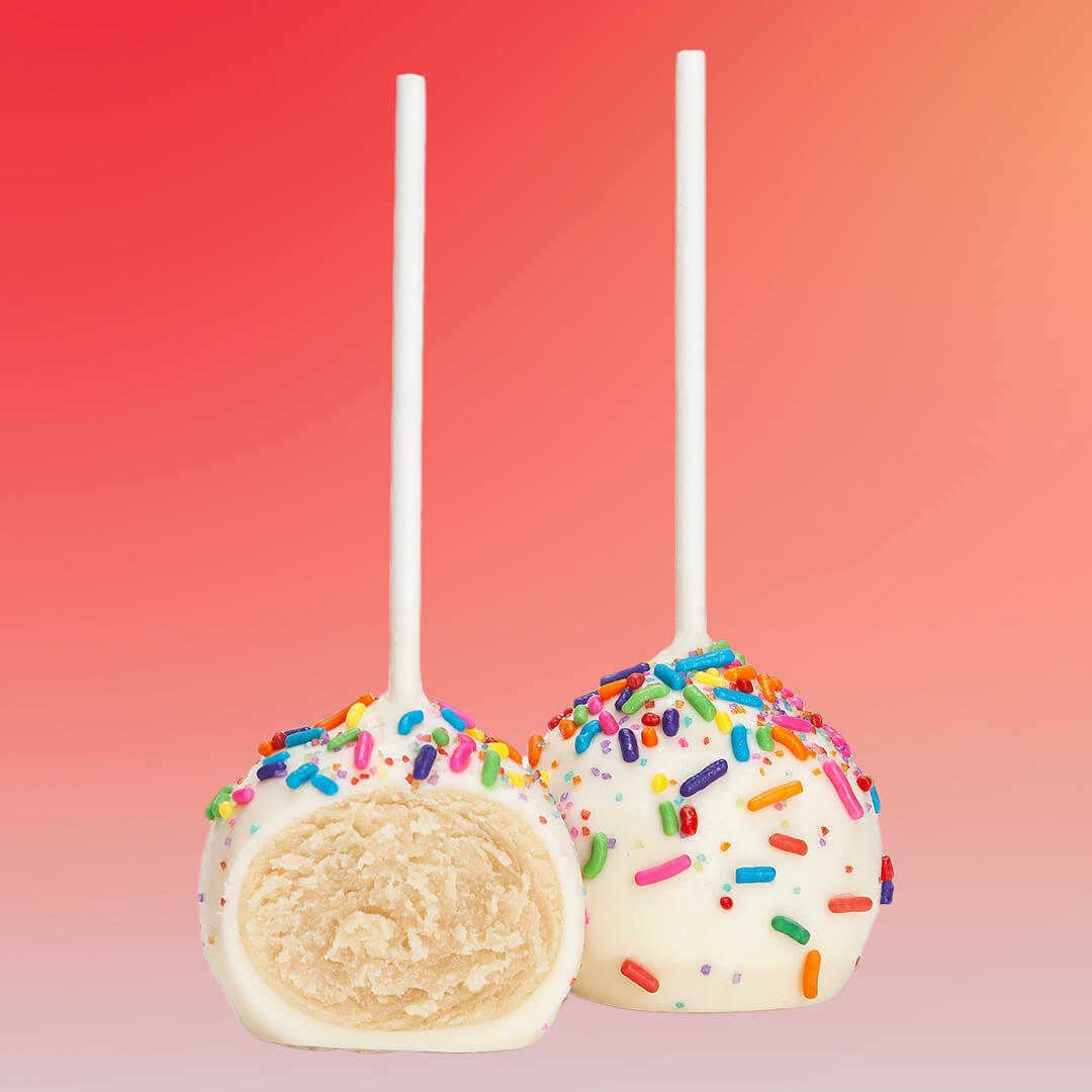 Two white cake pops with confetti sprinkles