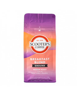 Purple and orange coffee bag with text that says Scooter's Coffee Breakfast Blend
