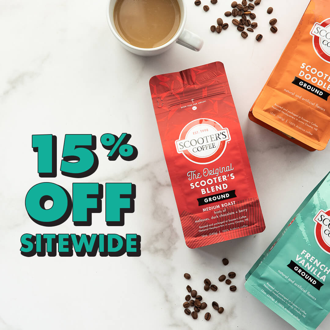 Bagged coffee on table with text "15% off sitewide"